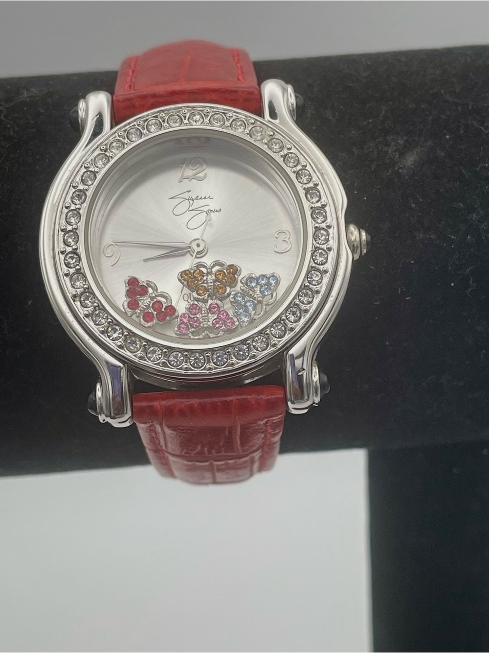 Suzanne Somers Watch with Floating 4 Rhinestone Butterflies. Red Leather Band